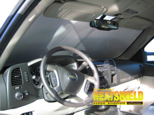 Heatshield Windshield Sun Shade for 2009 Chevrolet Silverado (interior view)