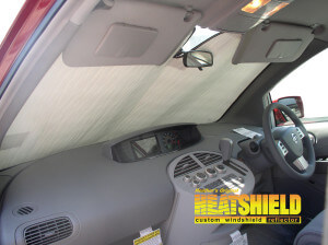 Heatshield Windshield Sun Shade for 2009 Nissan Quest (interior view)