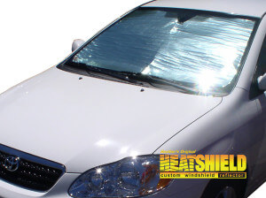 Heatshield Windshield Sun Shade for 2003, 2004, 2005, 2006, 2007, 2008 Toyota Corolla (exterior view)