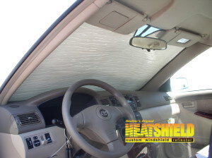 Heatshield Windshield Sun Shade for 2005 Toyota Corolla (interior view)